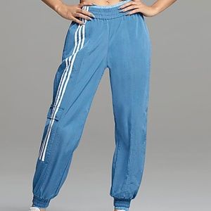 SLOUCHY ADIDAS X IVY PARK TRACK PANTS- Small